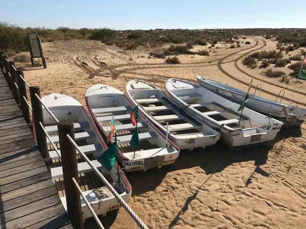Boats along the elevated walkway to the beach from Cabanas town, Algarve, Portugal. Photo by Jill Kimball